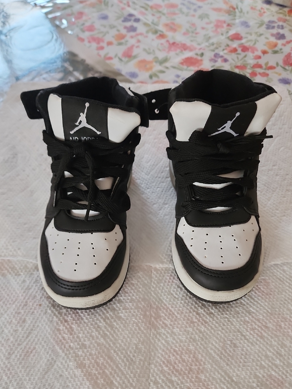 Jordan Kids Black and White High-Top Sneakers